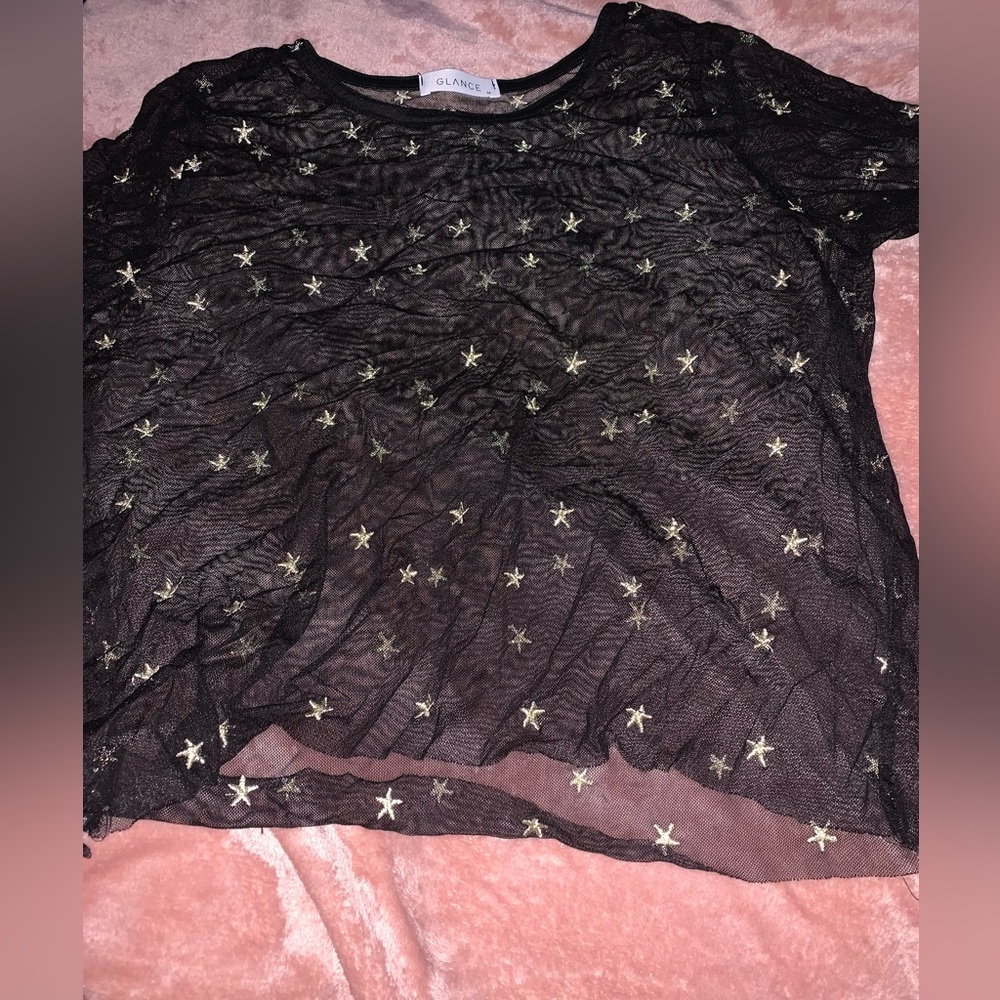 Black and gold sheer short sleeve shirt.